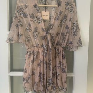 Front Tie Floral Blush Romper. Size Medium